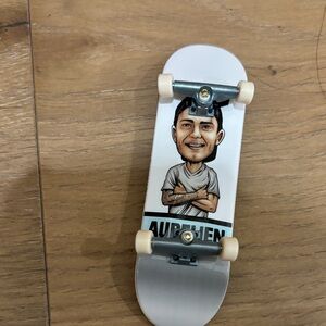 White Fingerboard Skateboard with Character Design